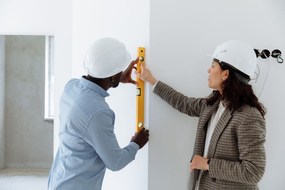 Professional contractor discussing home insulation options